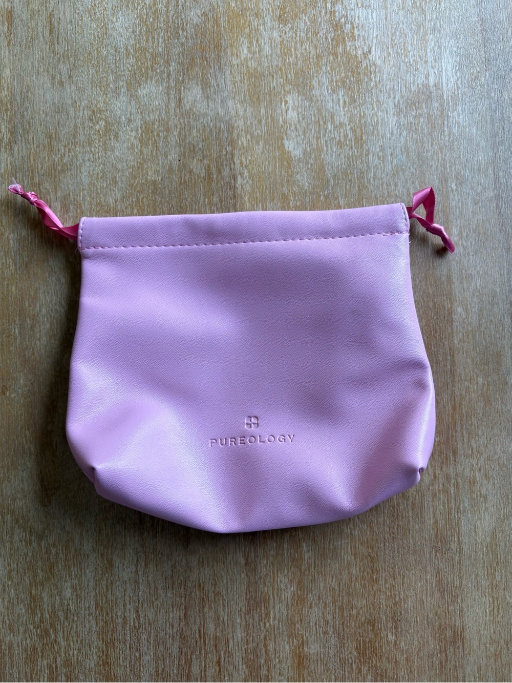 Pureology drawstring pouch in light pink pink ribbon drawstrings